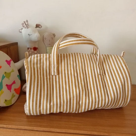 Striped duffle sales bag